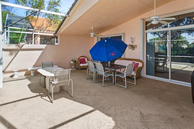 view of patio with a lanai