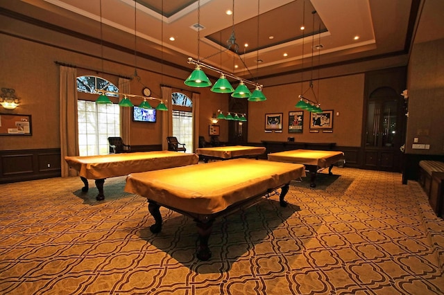 game room with carpet, a high ceiling, a tray ceiling, and pool table