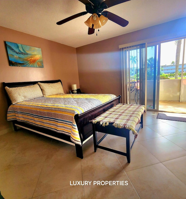 bedroom with access to exterior, ceiling fan, and light tile floors