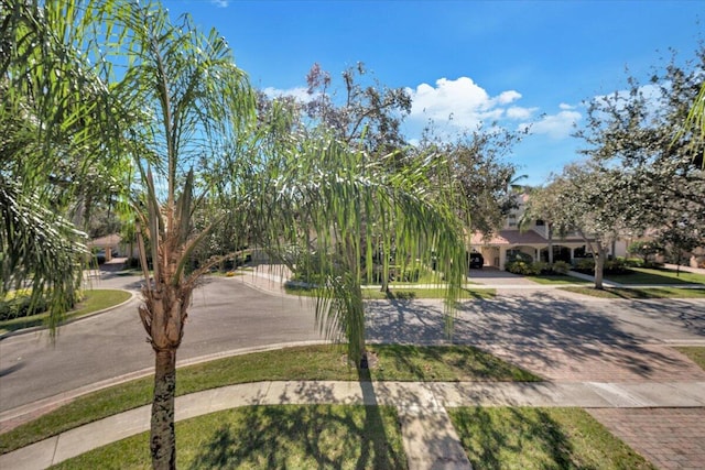 view of property hidden behind natural elements