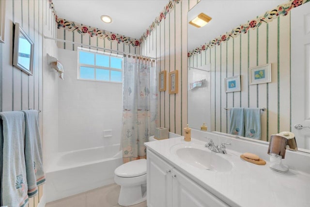 full bathroom with shower / tub combo, tile flooring, large vanity, and toilet