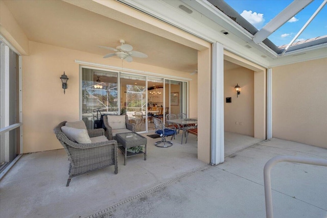 view of patio / terrace featuring ceiling fan