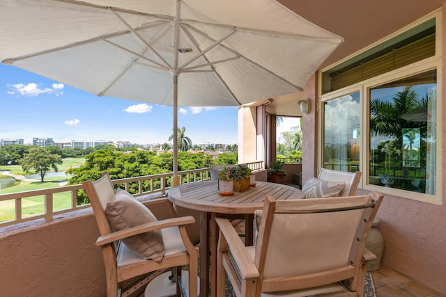 view of patio with a balcony