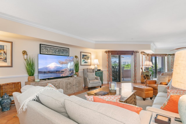 living room featuring crown molding