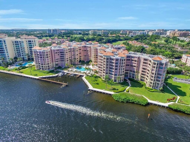 birds eye view of property featuring a water view