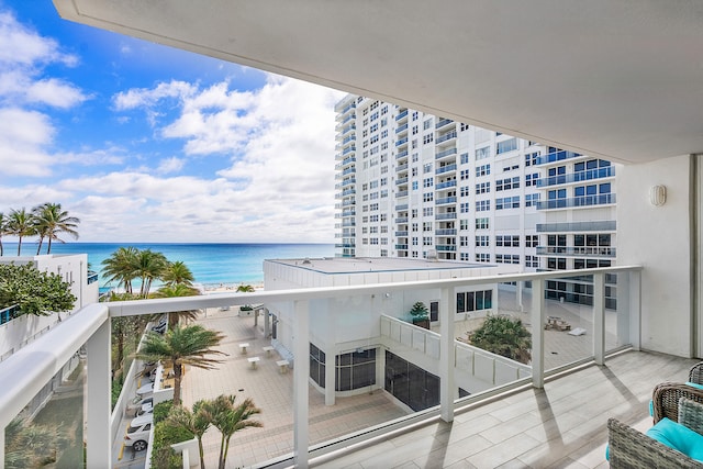 balcony featuring a water view