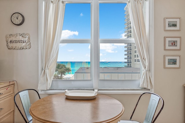 dining space with a water view