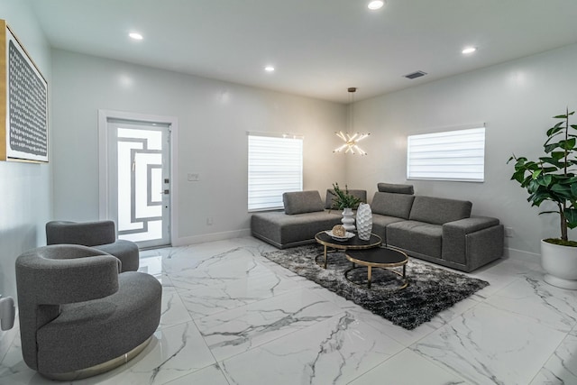 living room with marble finish floor, baseboards, visible vents, and recessed lighting