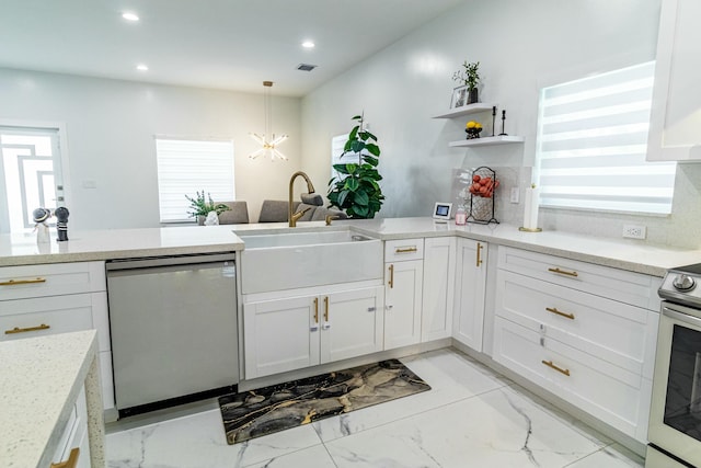 kitchen featuring white cabinetry, visible vents, appliances with stainless steel finishes, and a sink