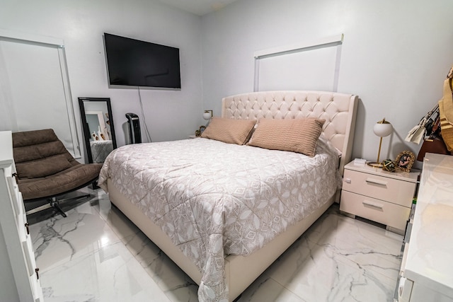 bedroom with marble finish floor