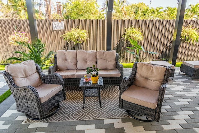 view of patio / terrace featuring outdoor lounge area and a fenced backyard