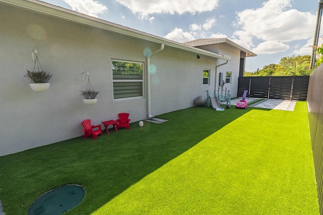 view of yard with a fenced backyard