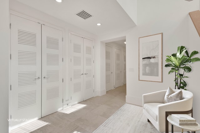 living area with light tile floors