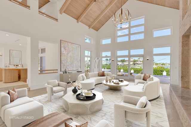 living room featuring a notable chandelier, high vaulted ceiling, wood ceiling, and beam ceiling