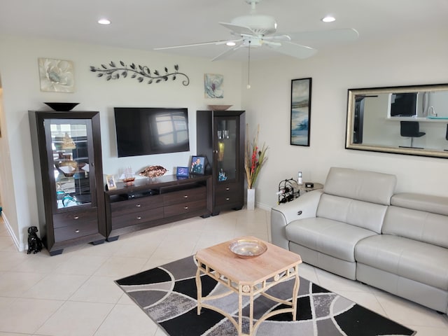 tiled living room featuring ceiling fan