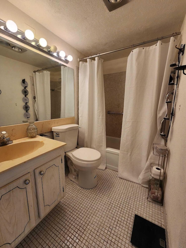 full bathroom with vanity, tile floors, shower / bathtub combination with curtain, a textured ceiling, and toilet