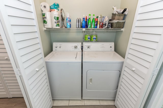 laundry area with independent washer and dryer