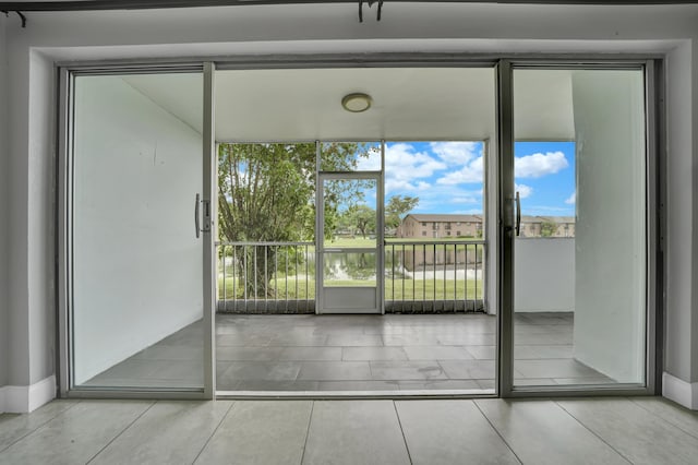 interior space with light tile patterned flooring