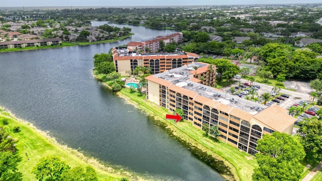 bird's eye view with a water view