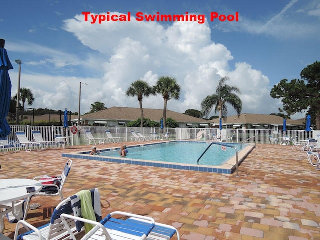 view of pool with a patio area