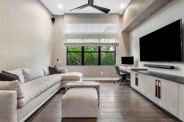 living room with built in desk and dark hardwood / wood-style floors