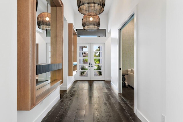 doorway featuring french doors and dark hardwood / wood-style floors