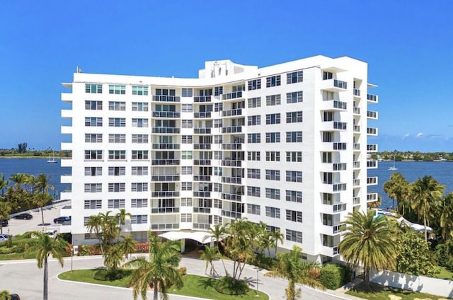 view of building exterior featuring a water view