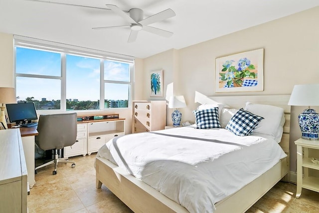 bedroom featuring ceiling fan and light tile patterned flooring