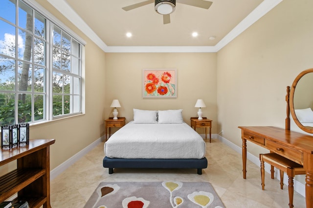 bedroom with ceiling fan and ornamental molding