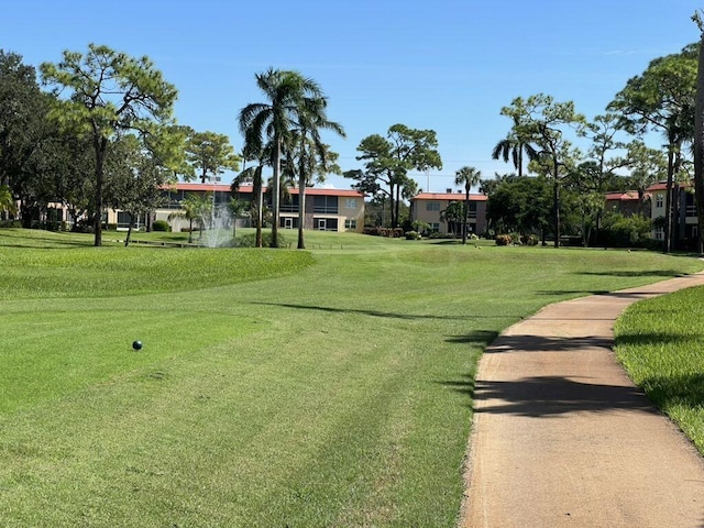 view of community featuring a lawn