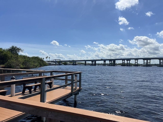 dock area featuring a water view