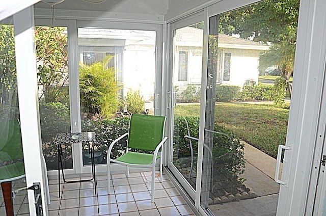 sunroom / solarium featuring plenty of natural light