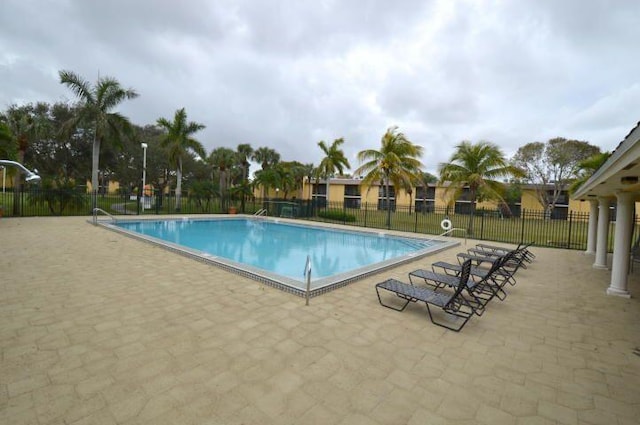 view of pool featuring a patio