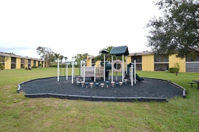 view of jungle gym featuring a yard