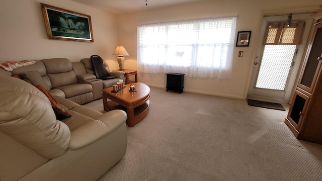 living room featuring light colored carpet