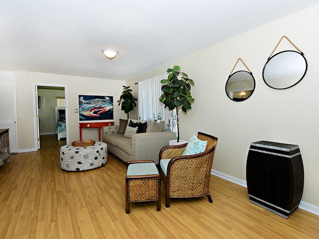 sitting room with light hardwood / wood-style floors