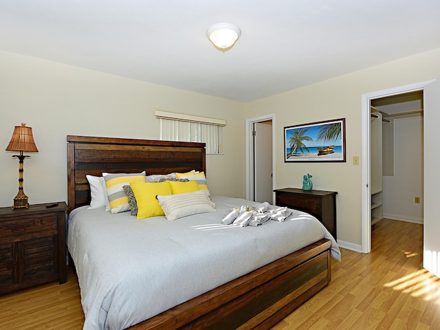 bedroom featuring light wood-type flooring