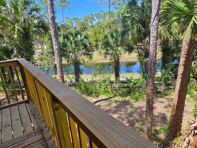 deck featuring a water view