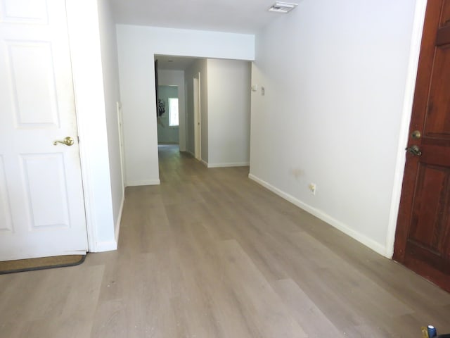 empty room featuring light hardwood / wood-style floors