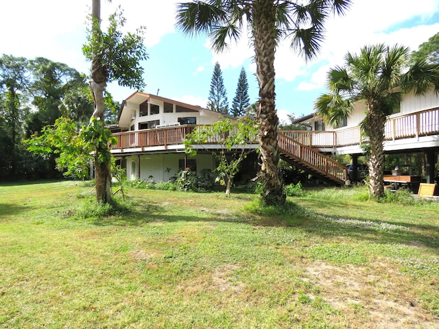 view of yard featuring a wooden deck