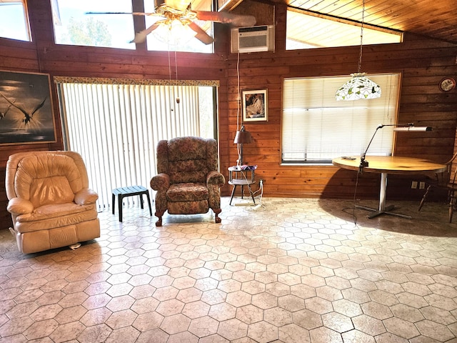 living room featuring ceiling fan, high vaulted ceiling, an AC wall unit, wooden walls, and wood ceiling