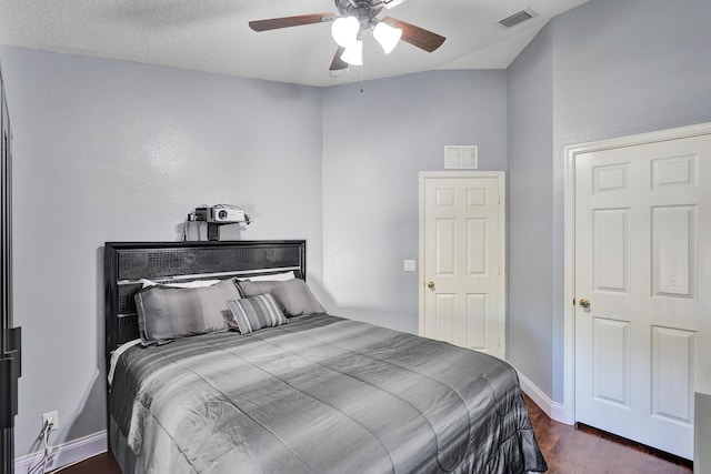 bedroom featuring dark wood-type flooring and ceiling fan