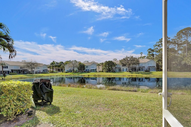 view of yard with a water view