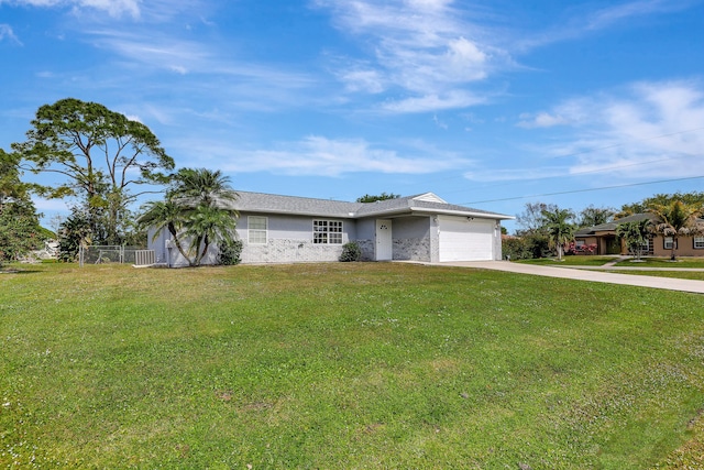 single story home featuring a front yard and a garage