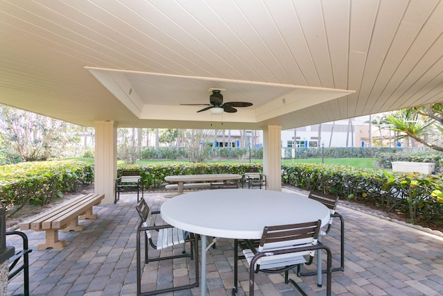 view of patio featuring ceiling fan