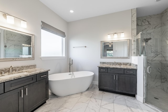 bathroom with vanity, separate shower and tub, and ceiling fan