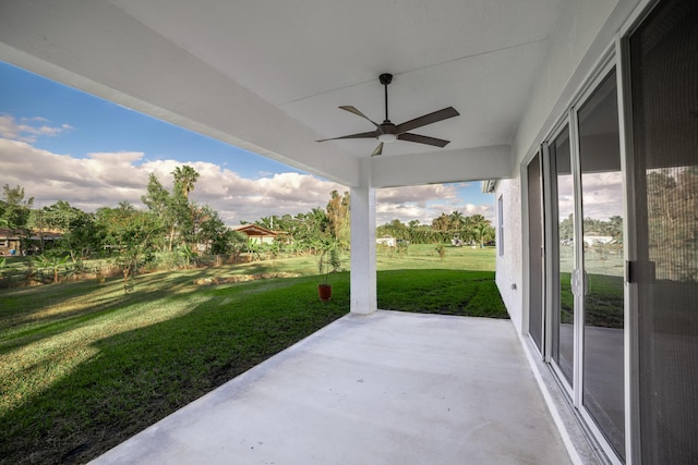 view of patio / terrace featuring ceiling fan