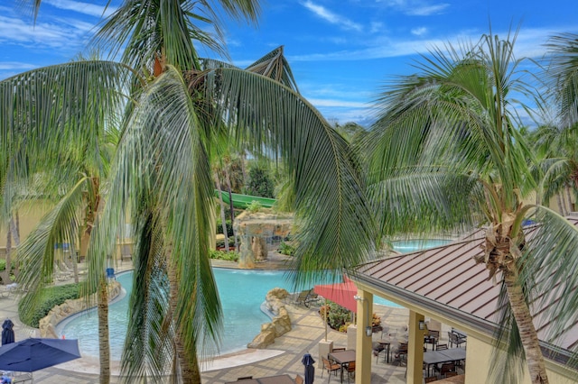 view of swimming pool featuring a patio