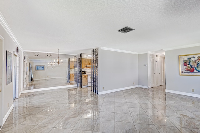 unfurnished living room with light tile flooring, a notable chandelier, a textured ceiling, and crown molding