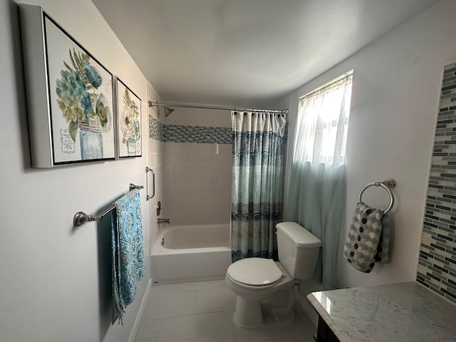 bathroom featuring toilet, tile floors, and shower / tub combo with curtain